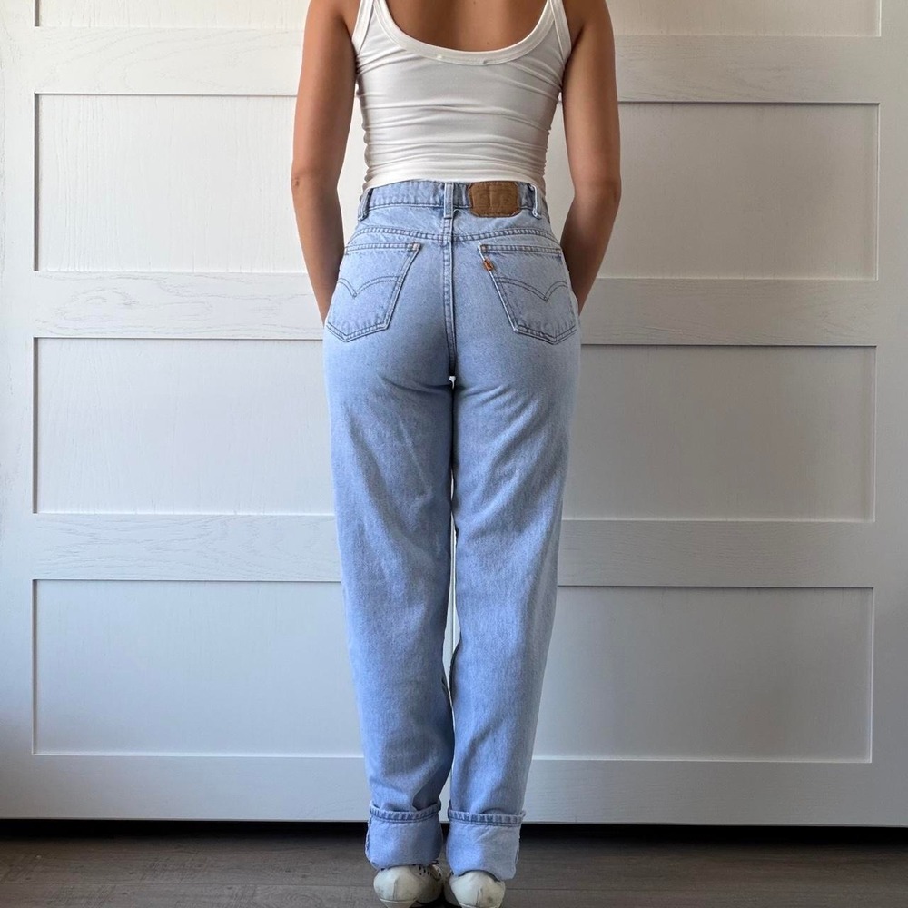 Vintage Levi's 550 Orange Tab Light Wash Jeans